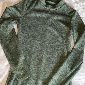 Long sleeve green dress.